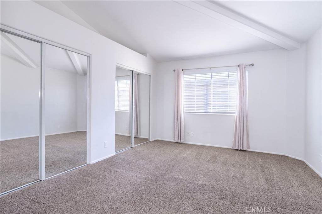 18347 Saticoy Street, Unit 28 Reseda, CA 91335 - Photo 15 of 27 an empty room with windows