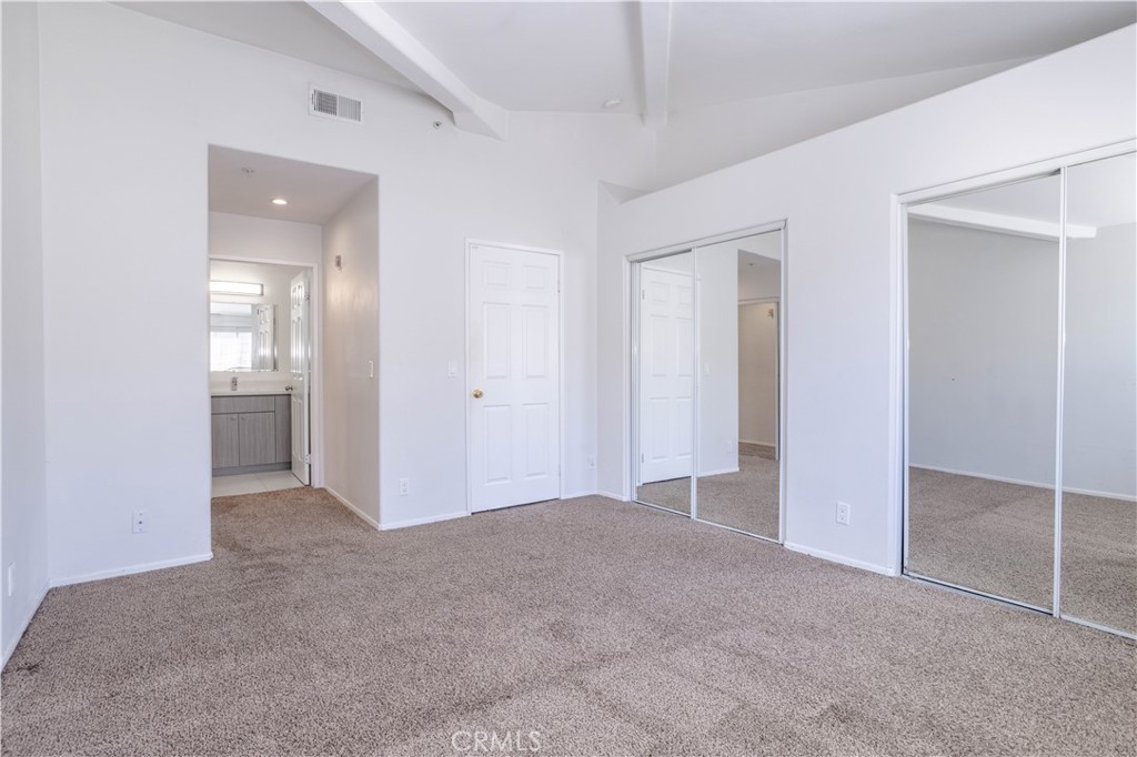 18347 Saticoy Street, Unit 28 Reseda, CA 91335 - Photo 16 of 27 wooden floor and closet in a room