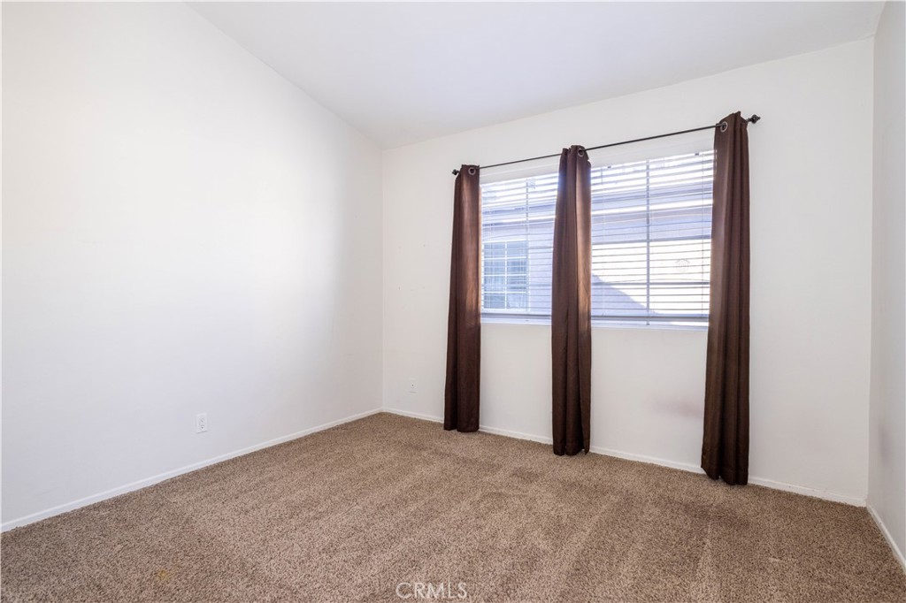 18347 Saticoy Street, Unit 28 Reseda, CA 91335 - Photo 19 of 27 a view of a room with a large window