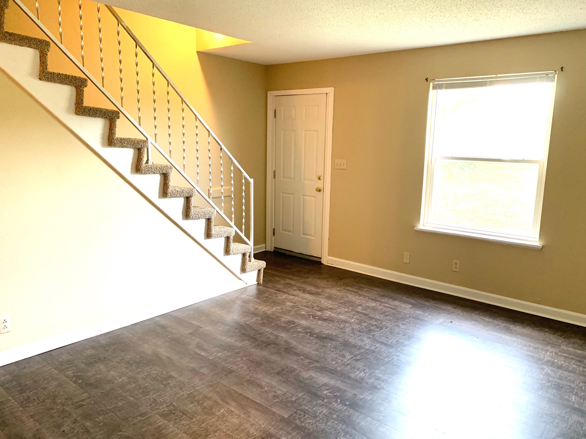1209 State Line Road, Unit 49 Oak Grove, KY 42262 - Photo 3 of 11 a view of an entryway with wooden floor