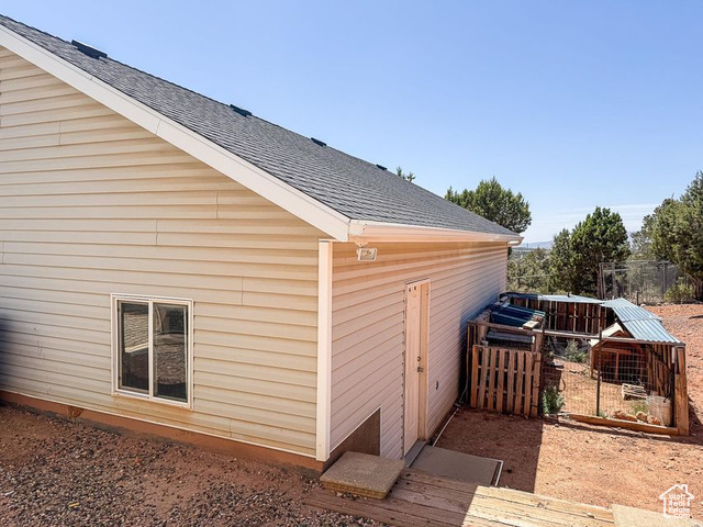 425 East Mule Deer Road Central, UT 84722 - Photo 62 of 72 View of side of home featuring roof with shingles