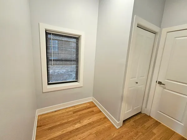 a view of an empty room and window