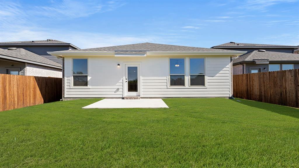 2516 YO Rnch Road Anna, TX 75409 - Photo 26 of 30 a front view of a house with a yard