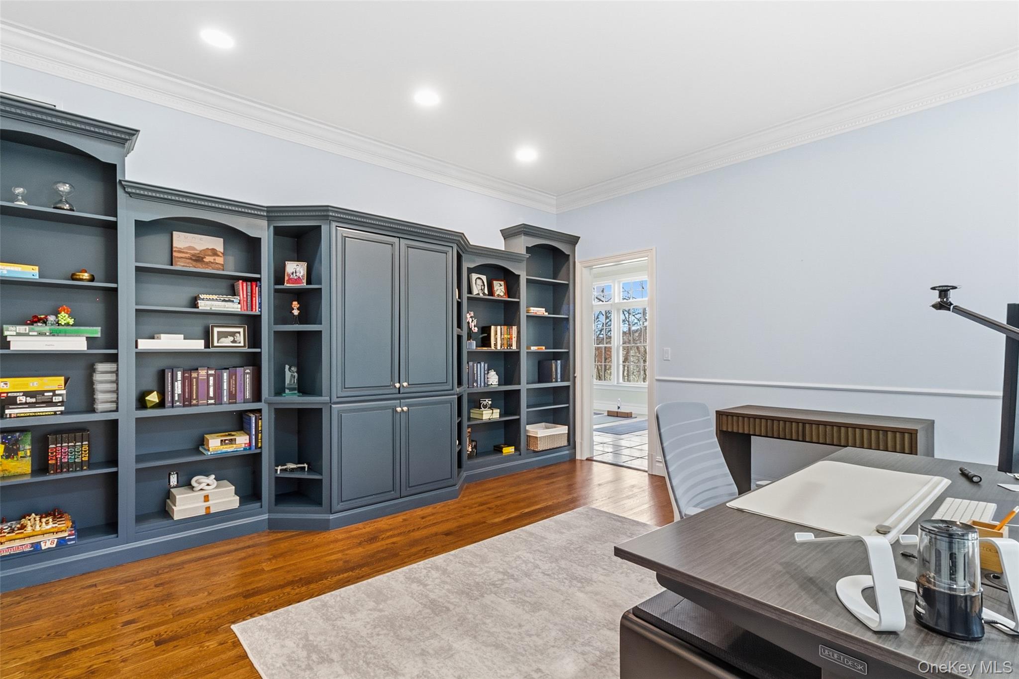 241 North Salem Road Waccabuc, NY 10597 - Photo 19 of 48 a living room with furniture and a book shelf