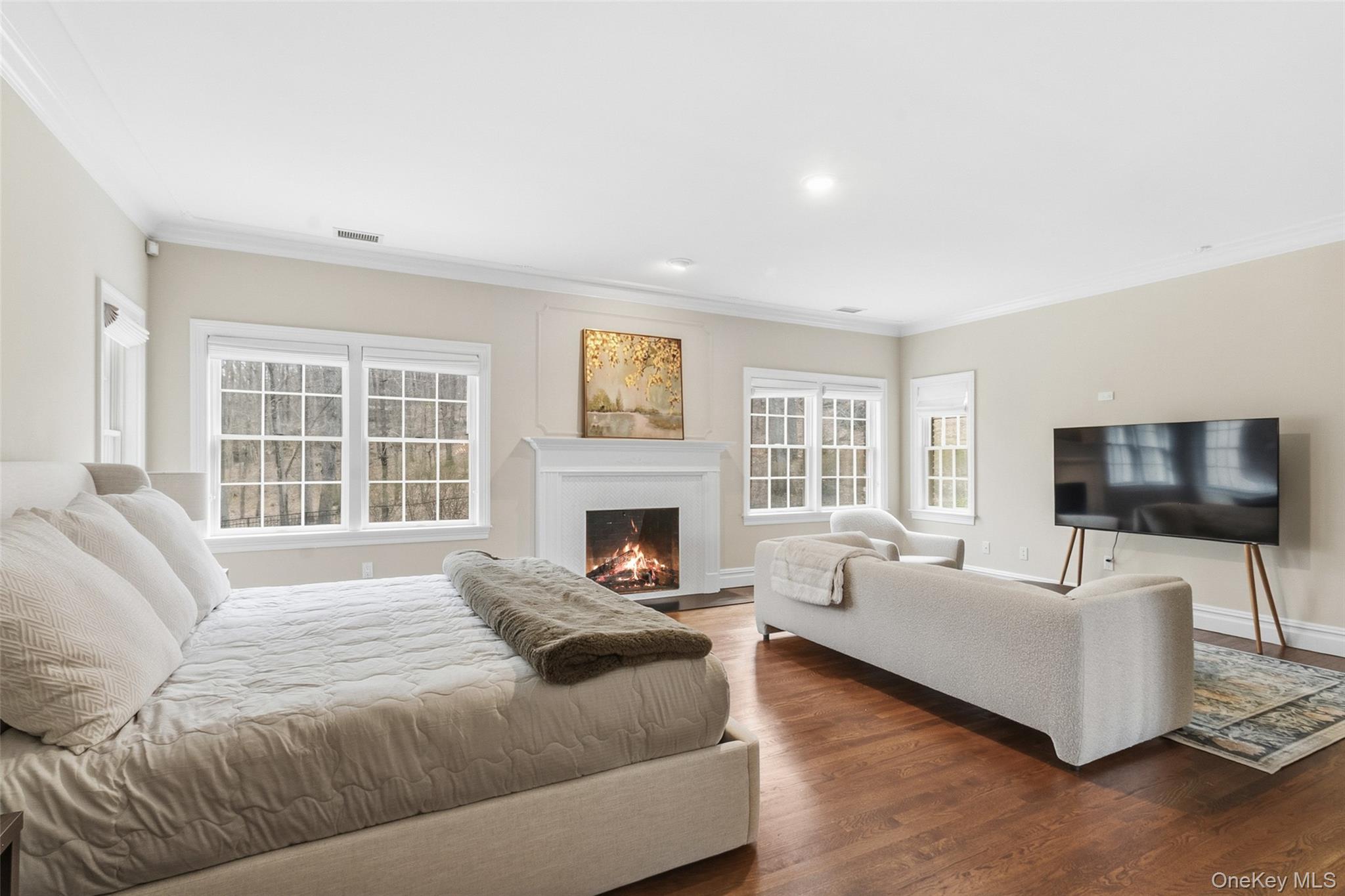 241 North Salem Road Waccabuc, NY 10597 - Photo 23 of 48 a spacious bedroom with a bed and a couch with window