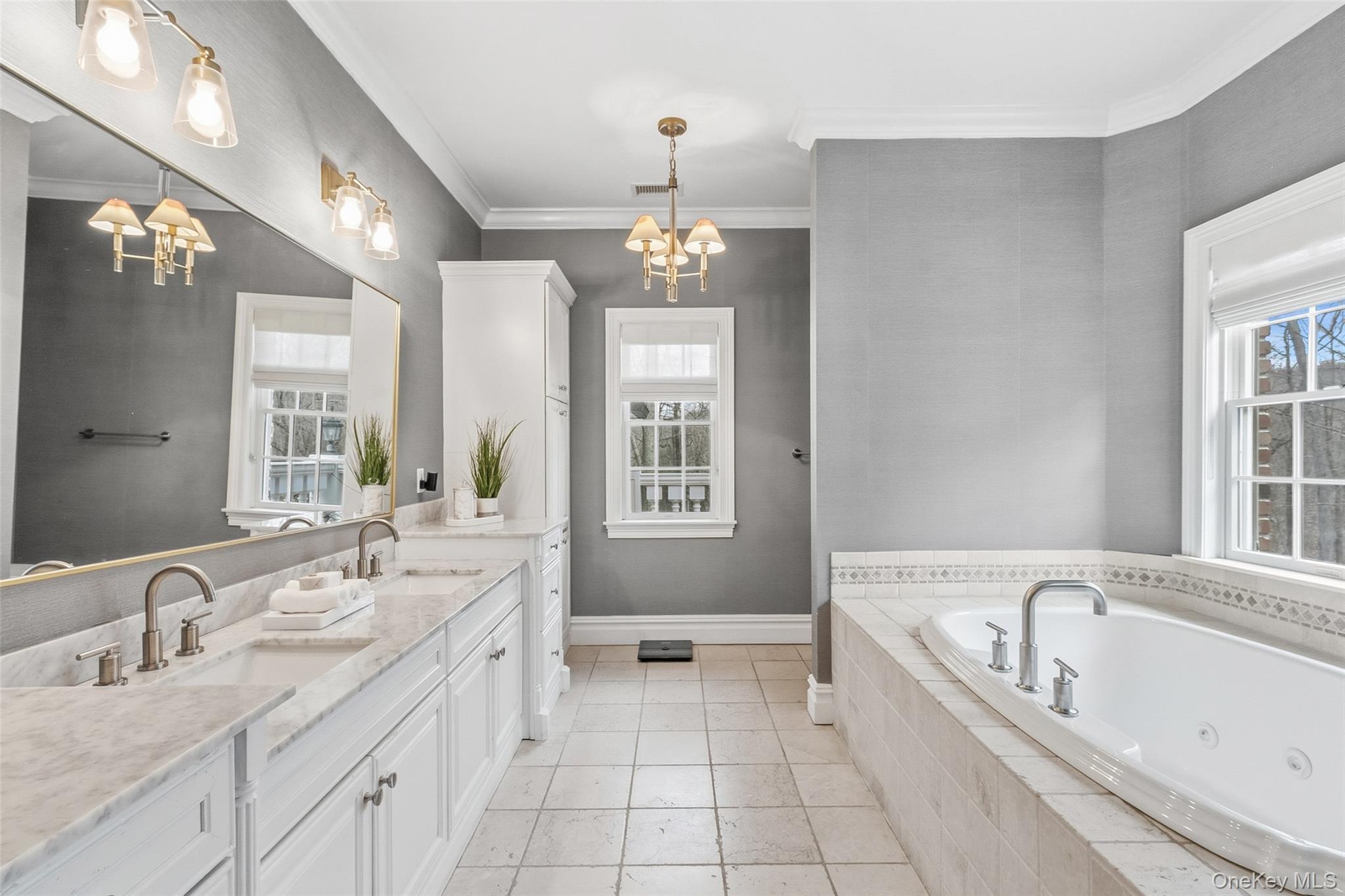 241 North Salem Road Waccabuc, NY 10597 - Photo 24 of 48 a spacious bathroom with a granite countertop tub a double vanity sink a window and a mirror