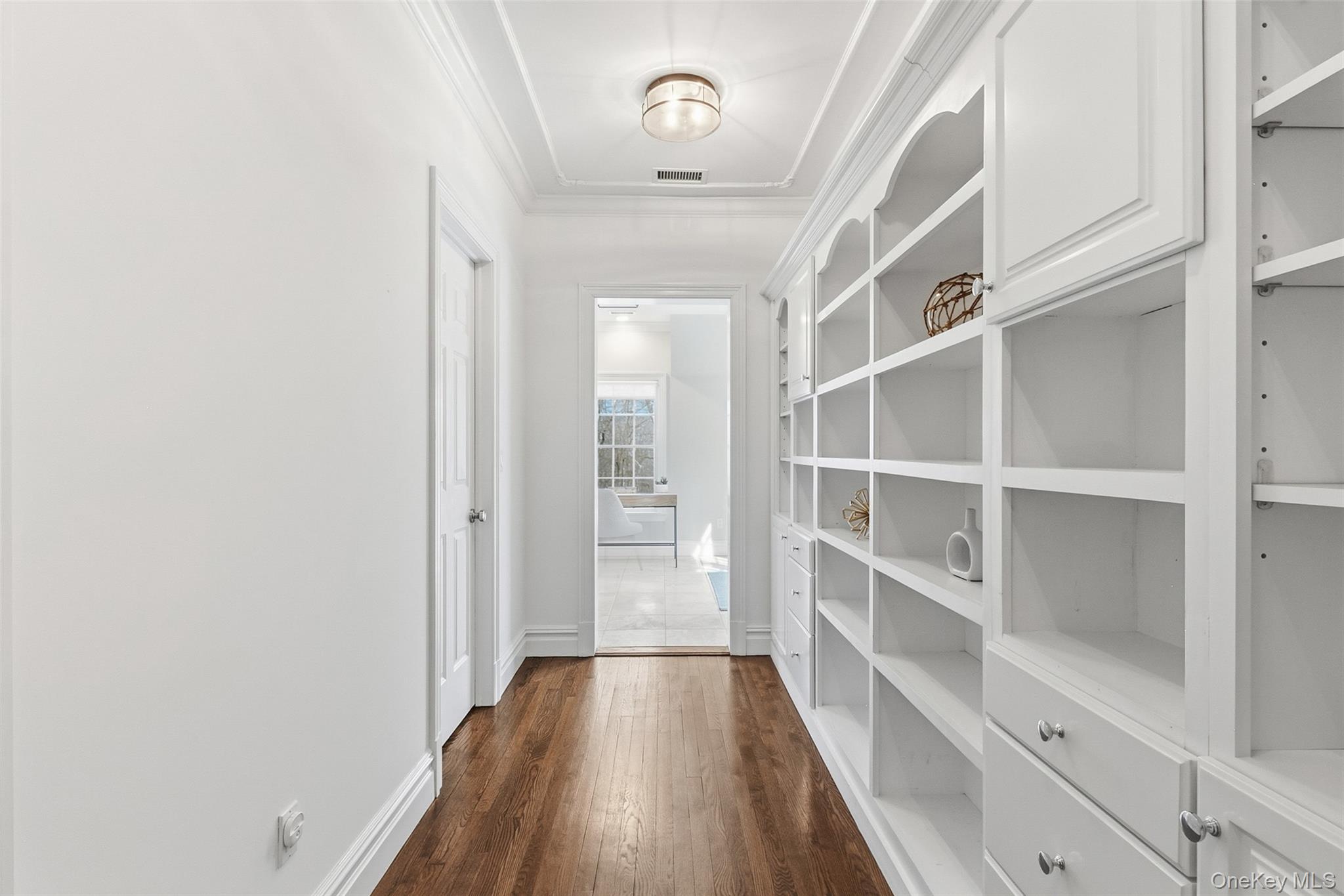 241 North Salem Road Waccabuc, NY 10597 - Photo 26 of 48 a view of a hallway with wooden floor and closet