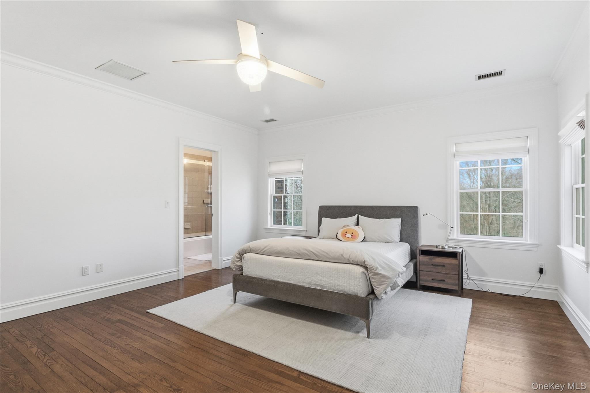 241 North Salem Road Waccabuc, NY 10597 - Photo 29 of 48 a spacious bedroom with a bed and a window