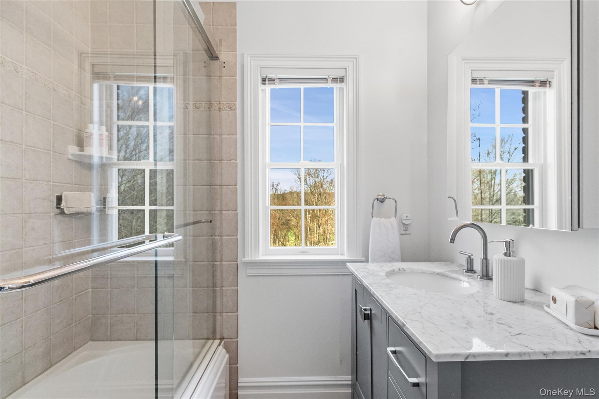 241 North Salem Road Waccabuc, NY 10597 - Photo 30 of 48 a bathroom with a granite countertop sink and a window