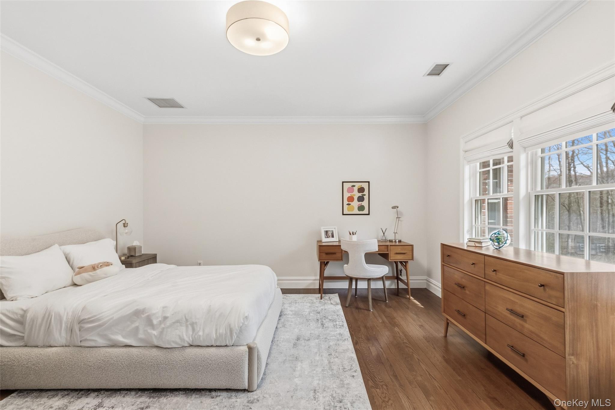 241 North Salem Road Waccabuc, NY 10597 - Photo 33 of 48 a bedroom with a bed and wooden floor