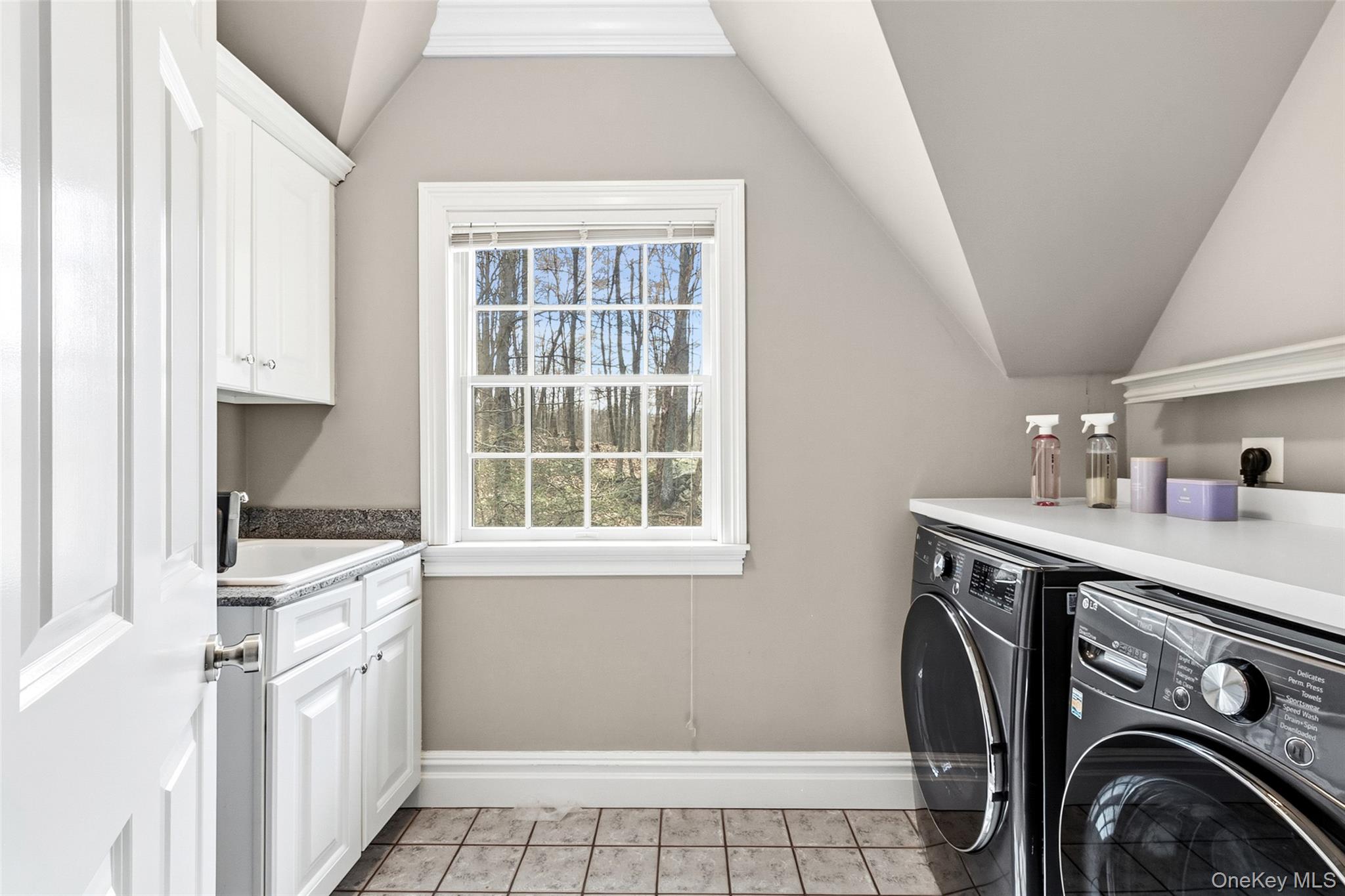 241 North Salem Road Waccabuc, NY 10597 - Photo 36 of 48 a kitchen with a sink a washer and dryer