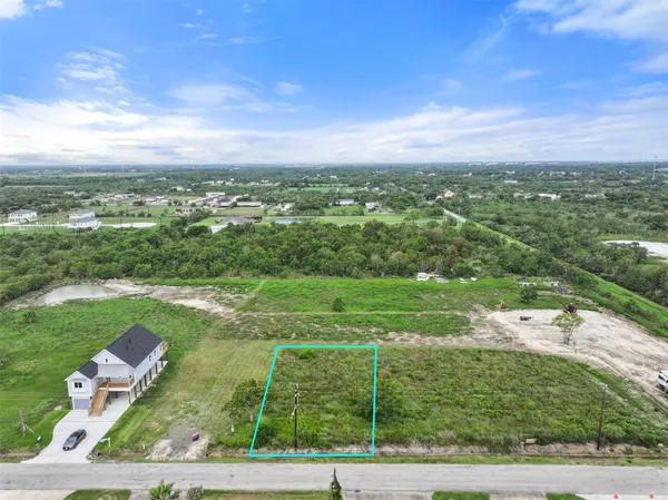 a view of a city with an ocean