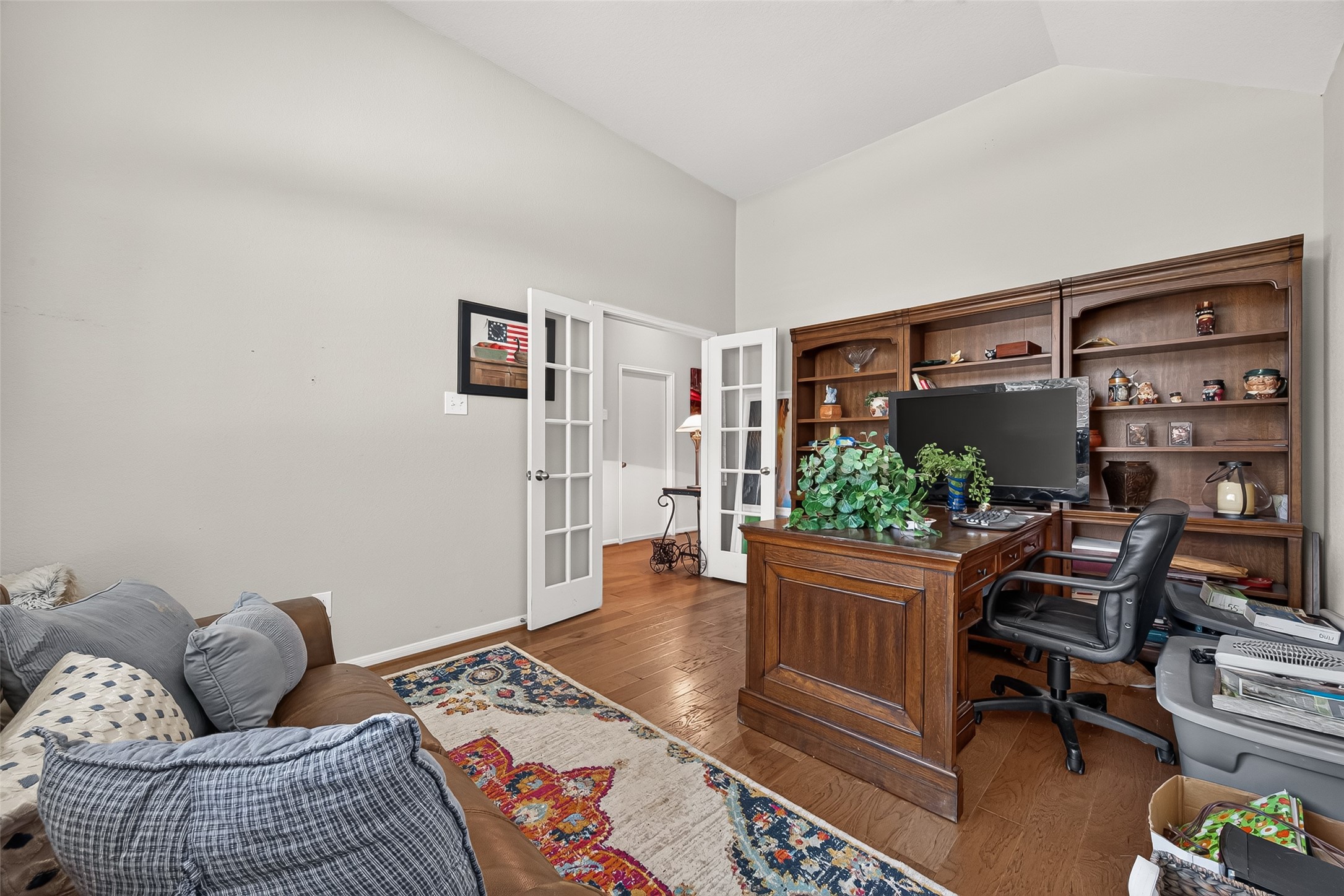 4910 Culver Lane Rosenberg, TX 77471 - Photo 15 of 50 Your home office/study has French doors and a large window creating a bright and inviting workspace.