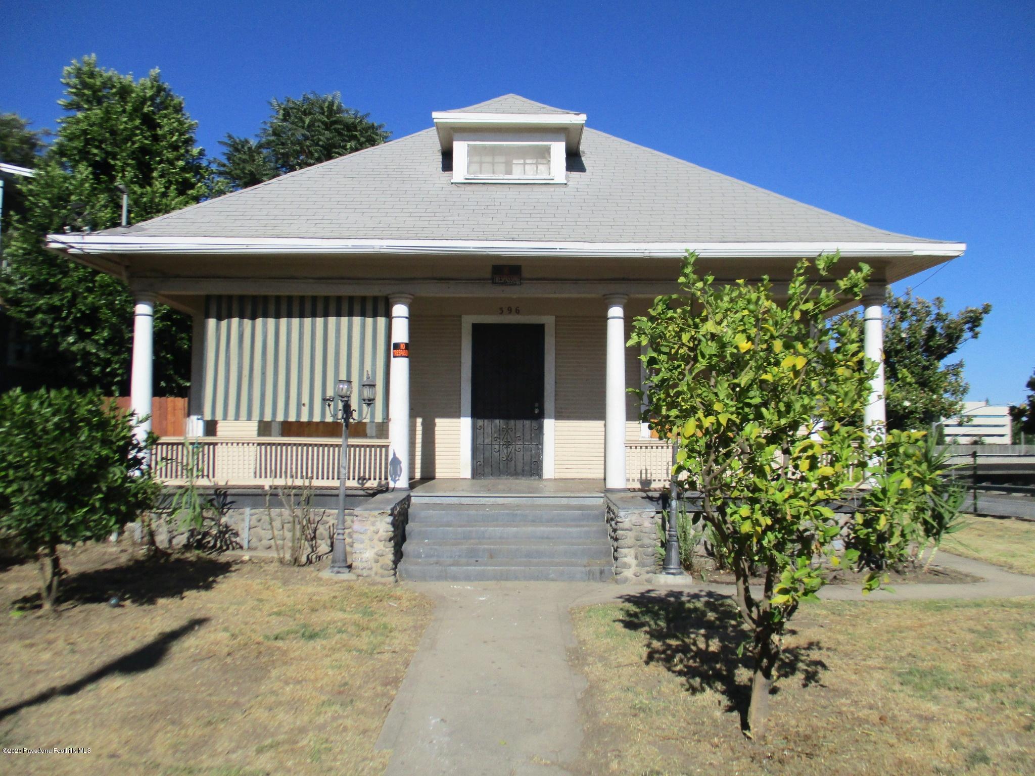 396 North Summit Avenue Pasadena, CA 91103 - Photo 2 of 12 a front view of a house with garden