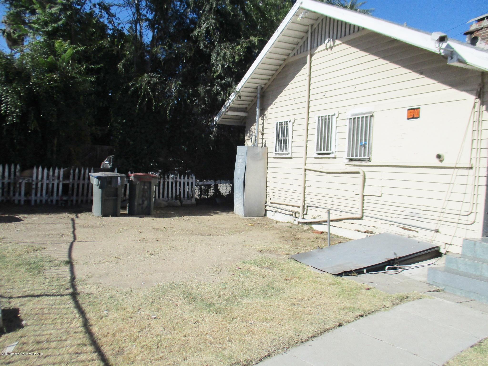396 North Summit Avenue Pasadena, CA 91103 - Photo 12 of 12 a view of a terrace with wooden fence