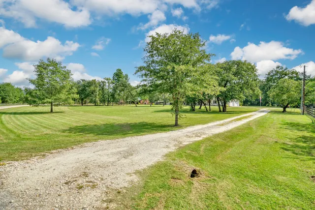 a view of a playground with basketball court