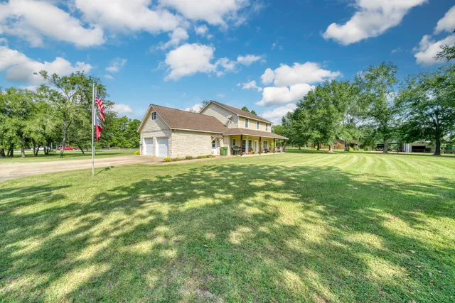 a house view with garden space