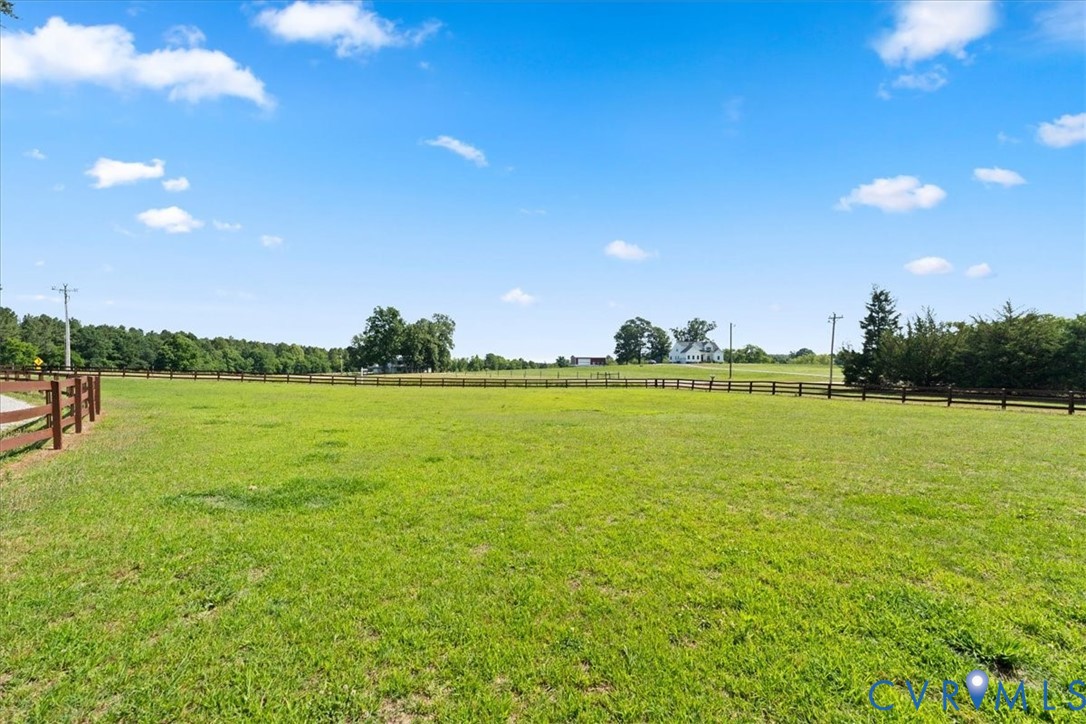 3137 Trenholm Road Powhatan, VA 23139 - Photo 50 of 72 Expansive green field featuring a natural wood-ton
