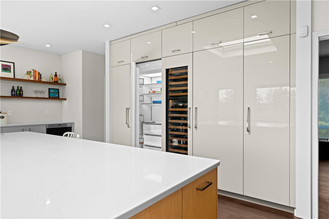 1506 Pleasant View Road Coopersburg, PA 18036 - Photo 31 of 97 Culinary adventures await in this modern kitchen, featuring a built-in refrigerator and wine cooler.
