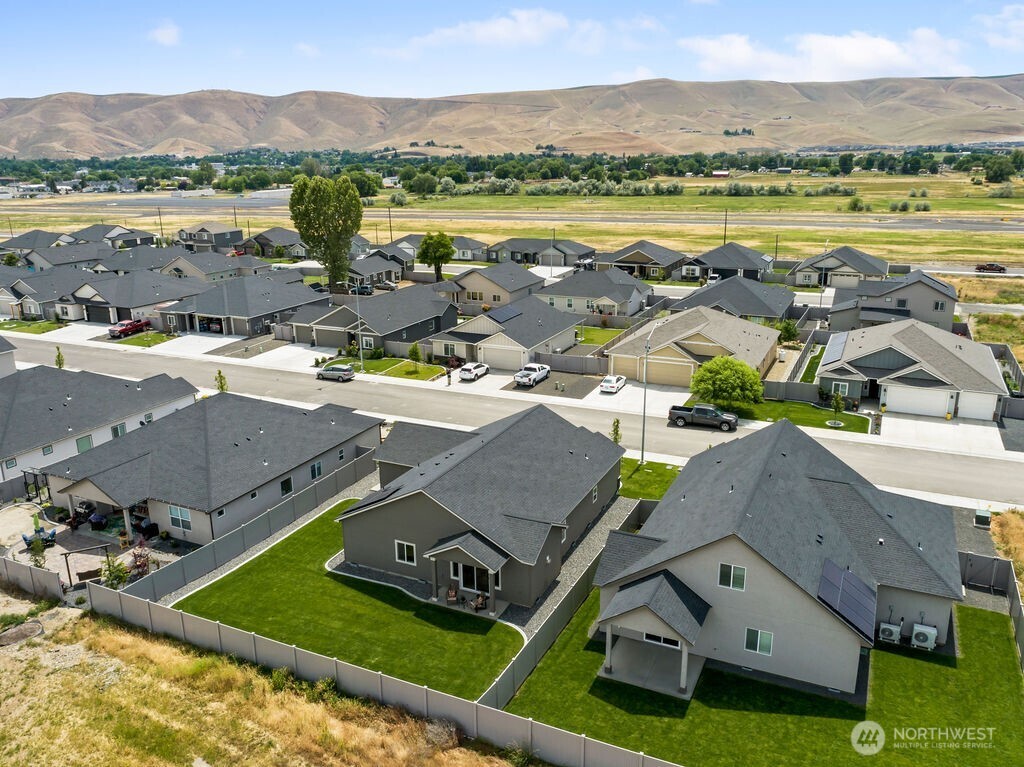 231 Shrute Road Prosser, WA 99350 - Photo 34 of 36 an aerial view of residential houses with outdoor space and river