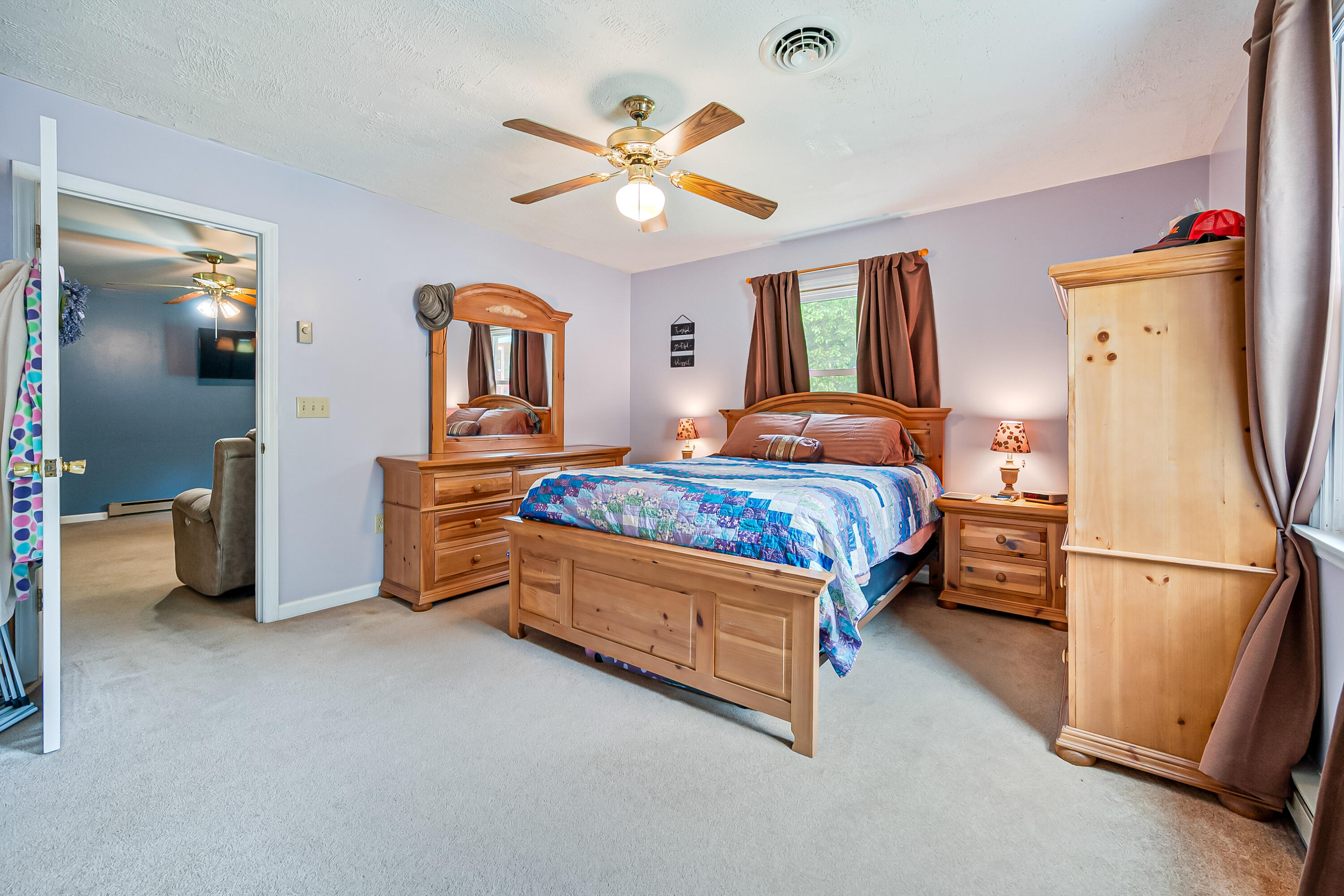 1365 Brake Road Elliston, VA 24087 - Photo 19 of 98 a bedroom with a bed and a walk in closet