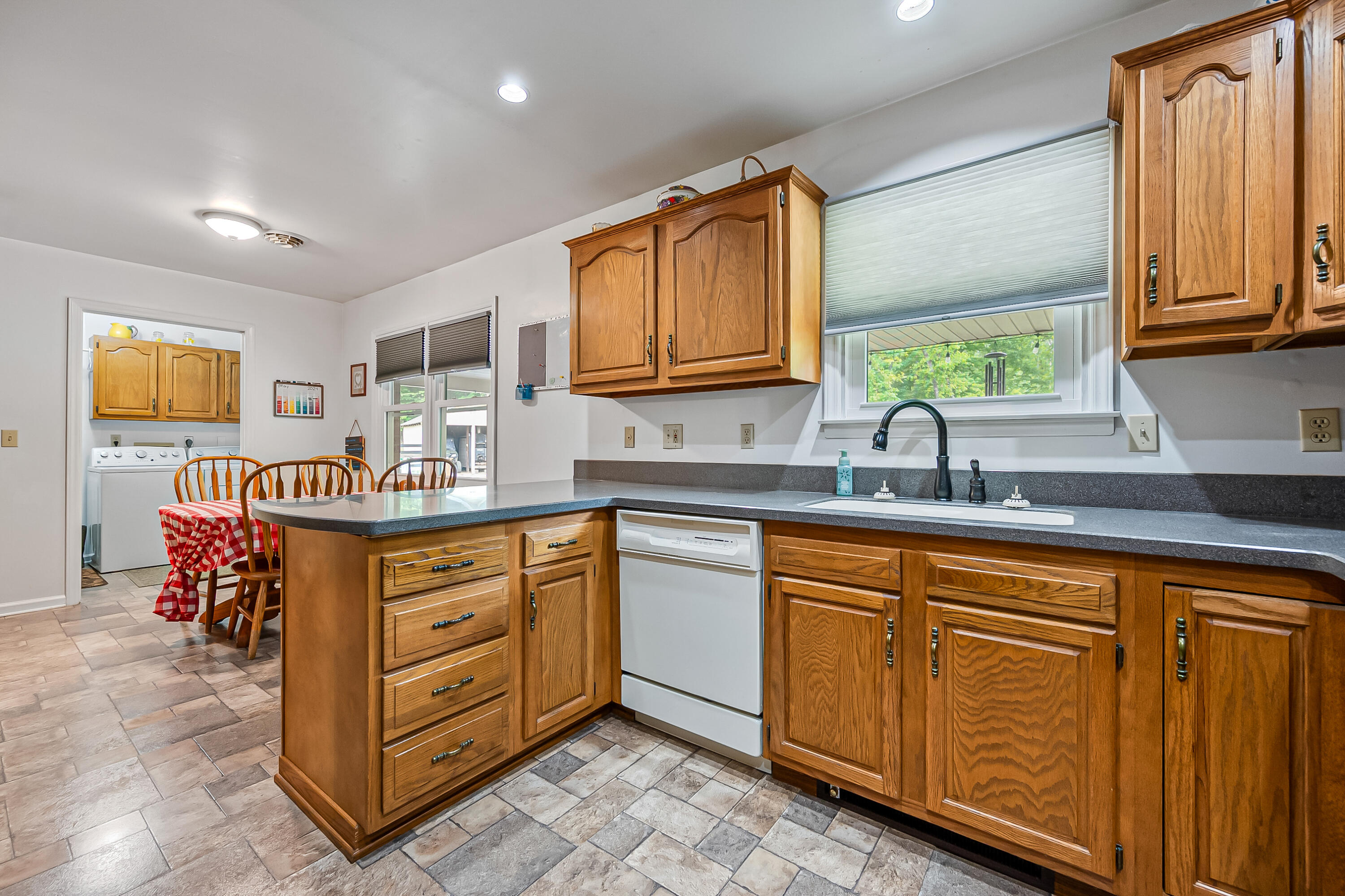 1365 Brake Road Elliston, VA 24087 - Photo 25 of 98 a kitchen with stainless steel appliances granite countertop a sink and cabinets