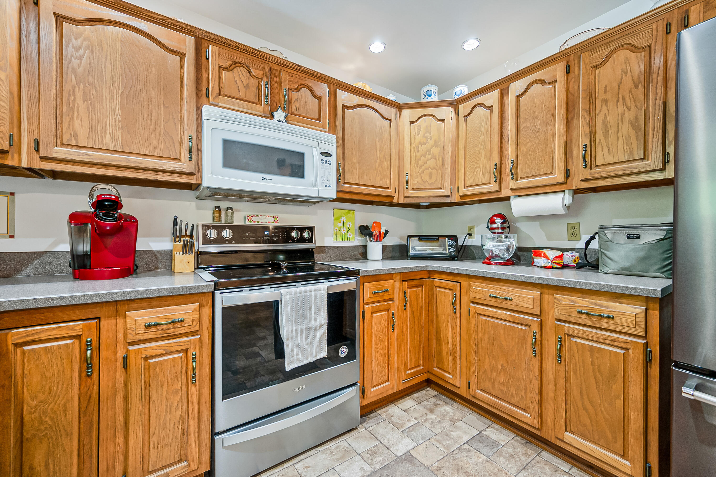 1365 Brake Road Elliston, VA 24087 - Photo 27 of 98 a kitchen with stainless steel appliances granite countertop a sink a stove and cabinets