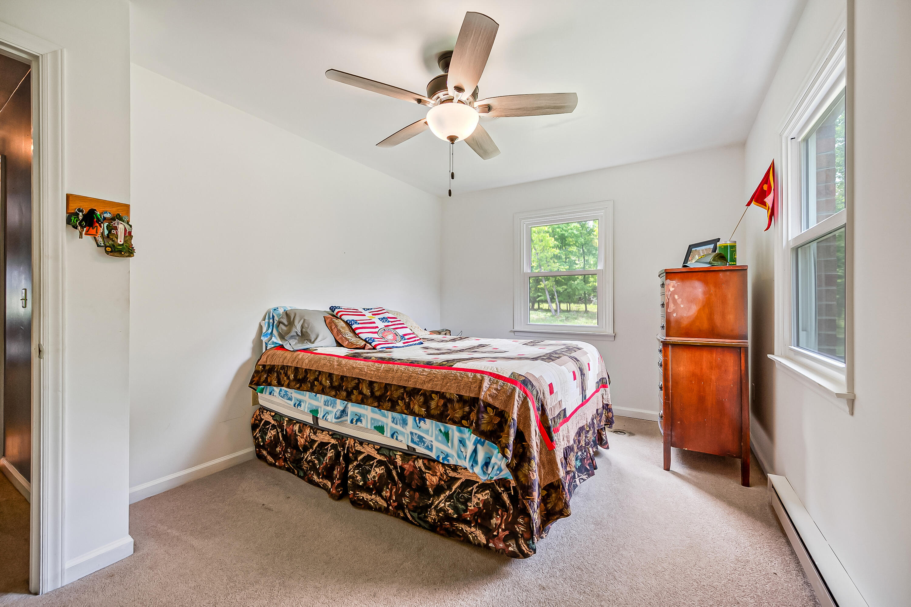 1365 Brake Road Elliston, VA 24087 - Photo 39 of 98 a bedroom with a bed and a window