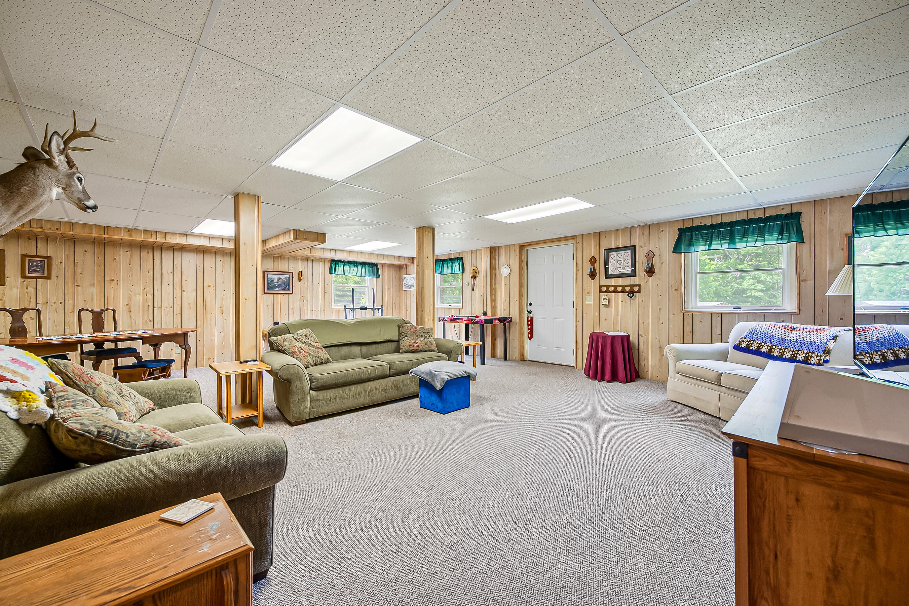 1365 Brake Road Elliston, VA 24087 - Photo 42 of 98 a living room with furniture and a floor to ceiling window