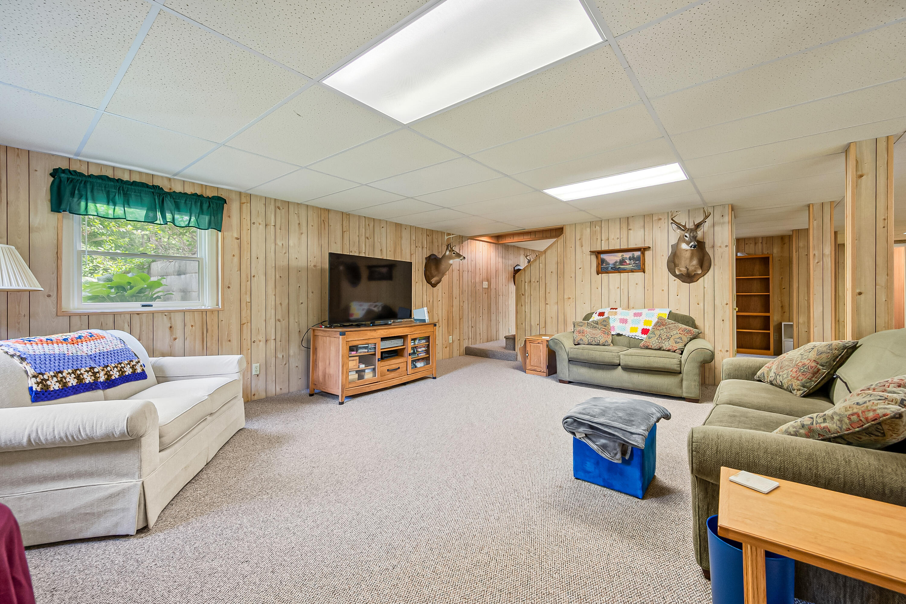 1365 Brake Road Elliston, VA 24087 - Photo 44 of 98 a living room with furniture and a flat screen tv