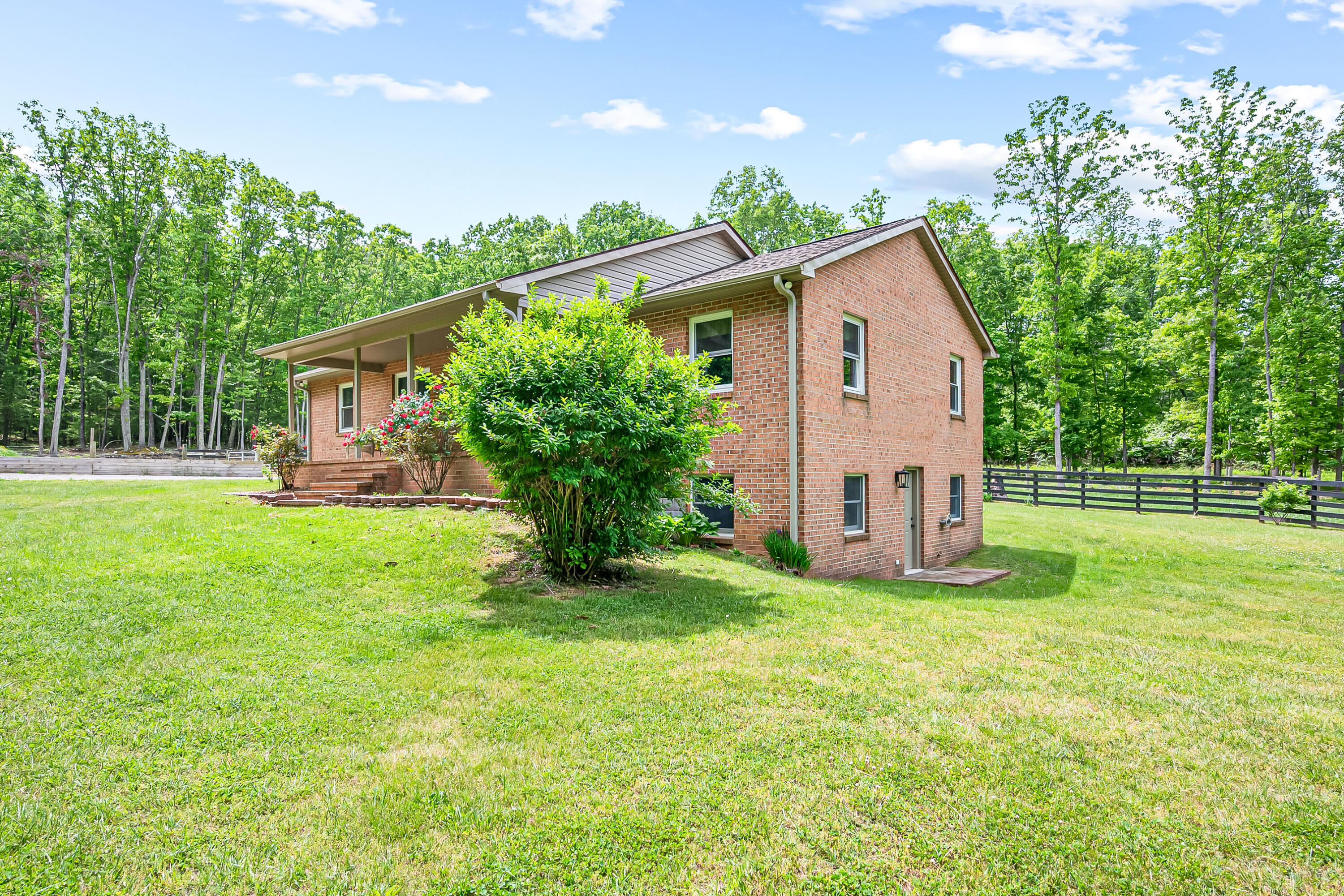 1365 Brake Road Elliston, VA 24087 - Photo 61 of 98 a house view with a garden space