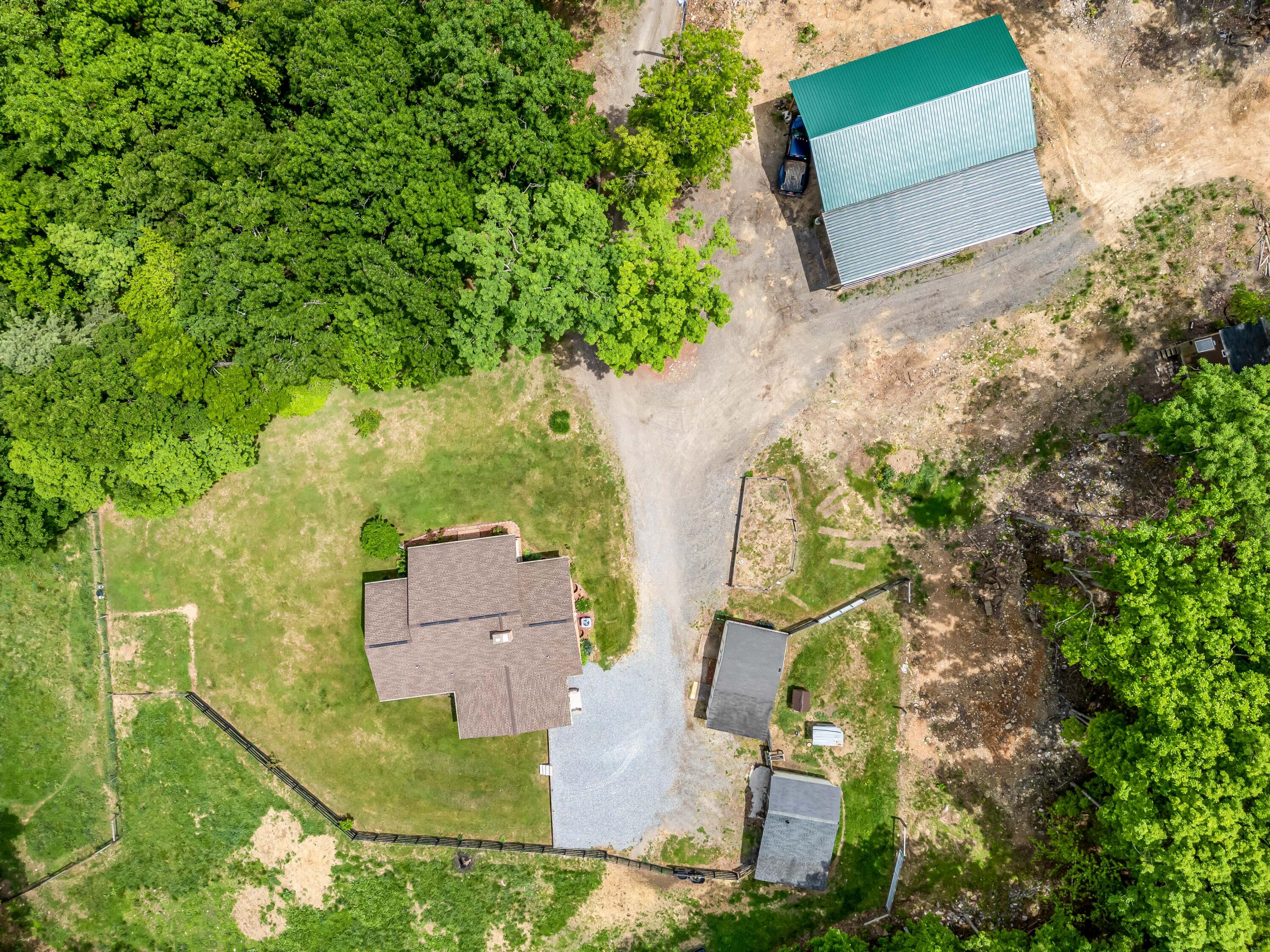 1365 Brake Road Elliston, VA 24087 - Photo 94 of 98 aerial view of a house with a yard and a large tree