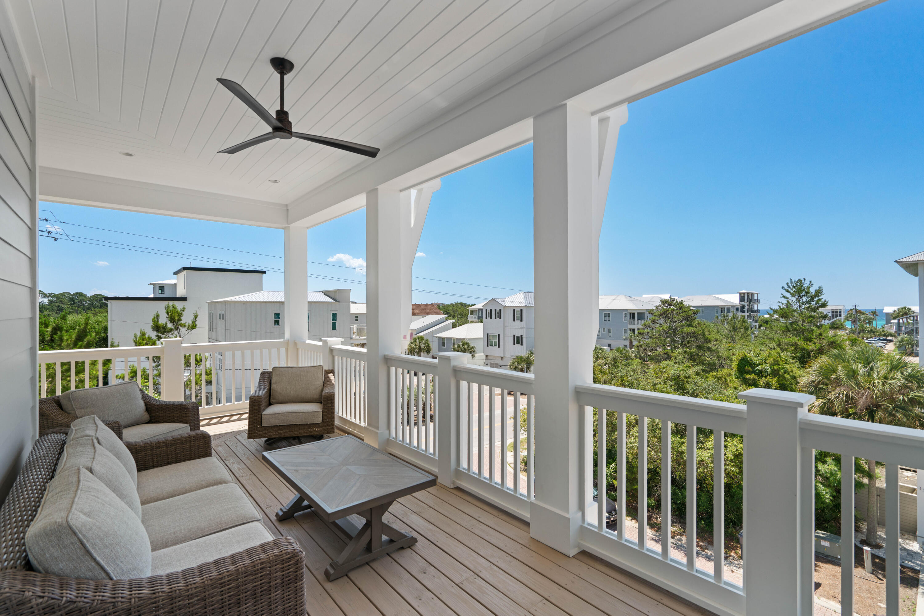 16 Bluewater View Ave Inlet Beach Inlet Beach, FL 32461 - Photo 40 of 59 a view of a living room with furniture and a floor to ceiling window