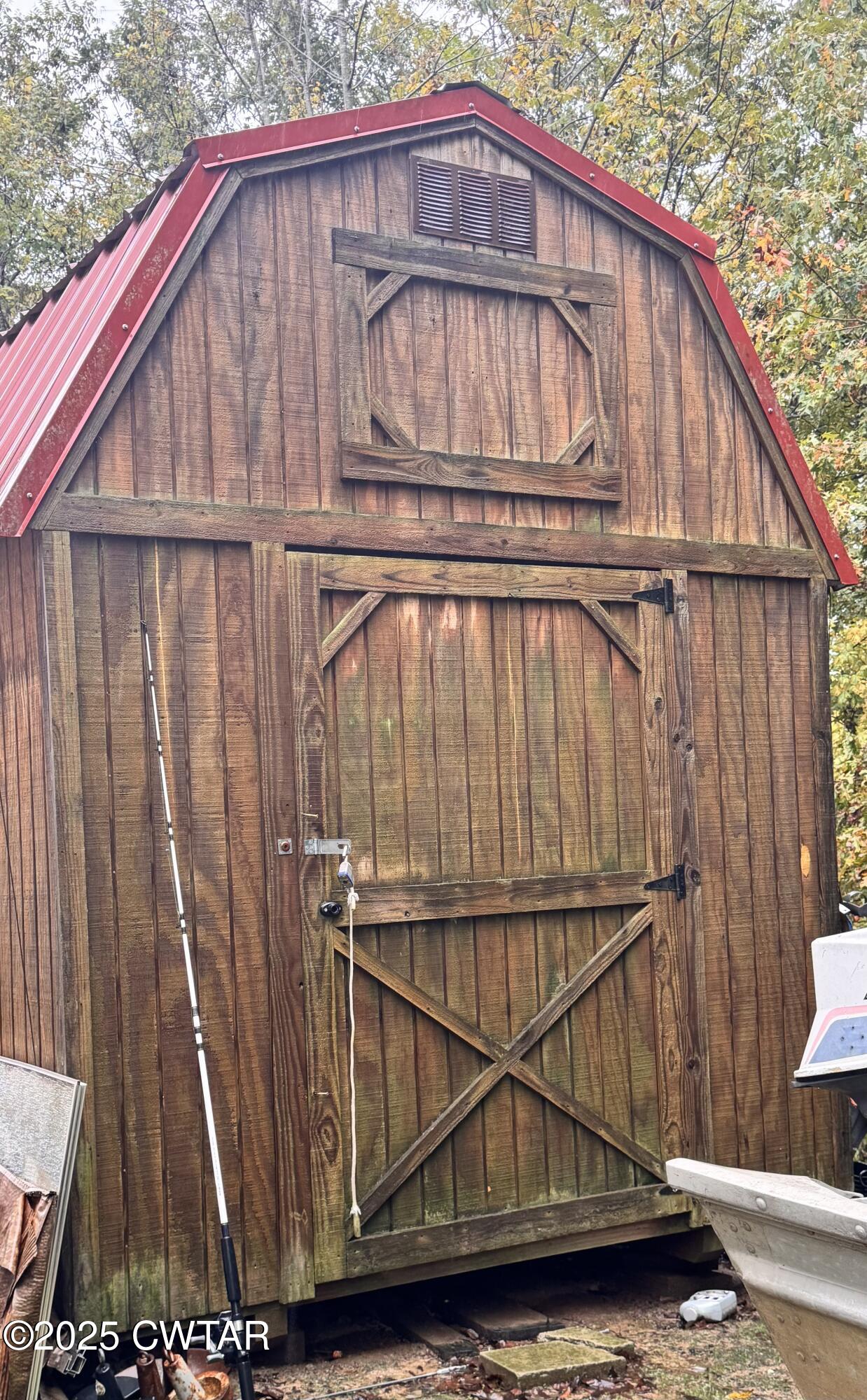 2727 Marvin Vaught Road Troy, TN 38260 - Photo 18 of 19 a view of a house with wooden deck