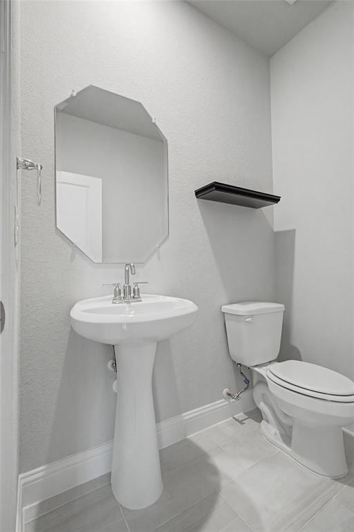 2344 Bellatrix Drive Haslet, TX 76052 - Photo 21 of 39 POWDER ROOM DOWN