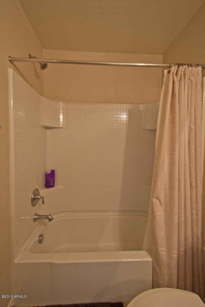 4073 East Tulsa Street Gilbert, AZ 85295 - Photo 28 of 33 a bathroom with a shower
