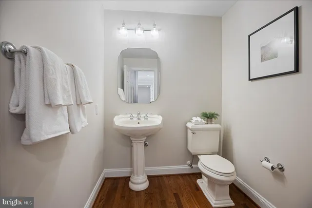 a living room with furniture flat screen tv and a fireplace