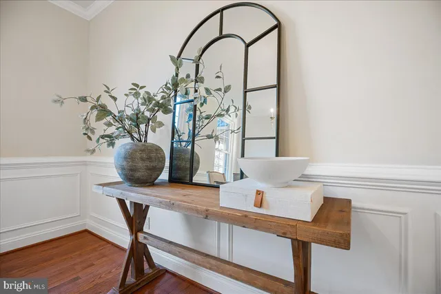 a kitchen with stainless steel appliances granite countertop a refrigerator a sink a stove and island