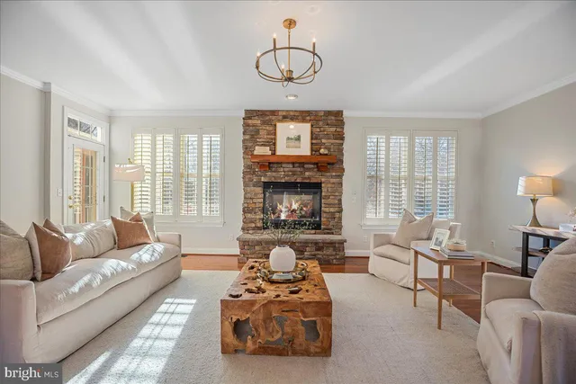 a bathroom with a granite countertop sink a mirror and a shower