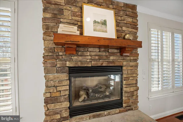a bathroom with a tub and a window