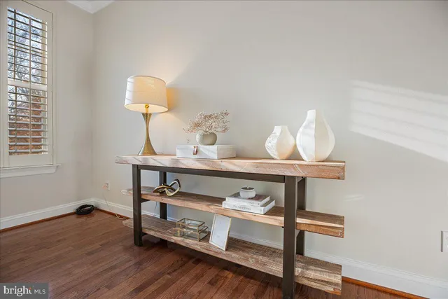 a white bath tub sitting next to a toilet