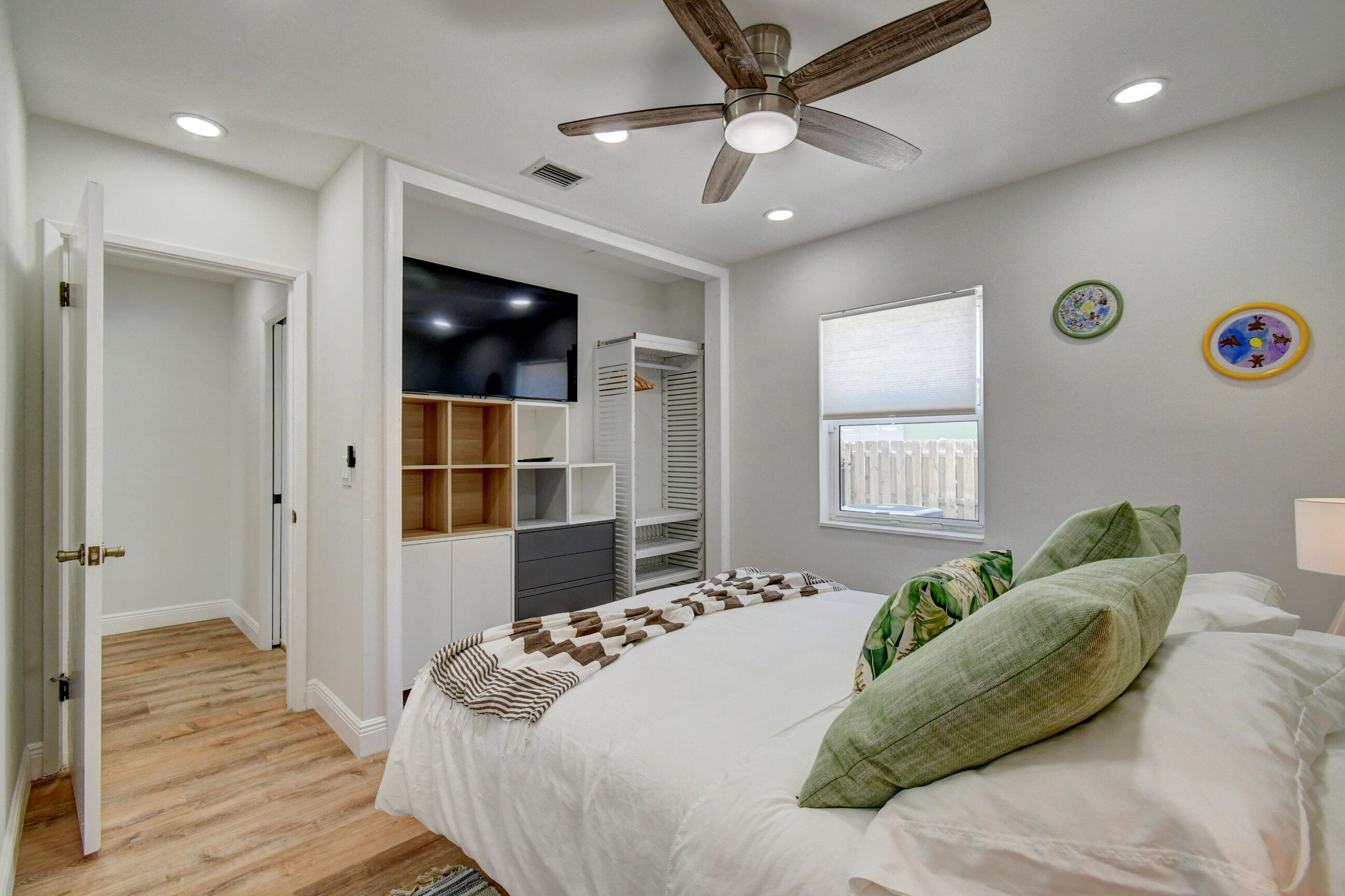 309 Rilyn Drive West Palm Beach, FL 33405 - Photo 13 of 26 a bedroom with a bed and a window