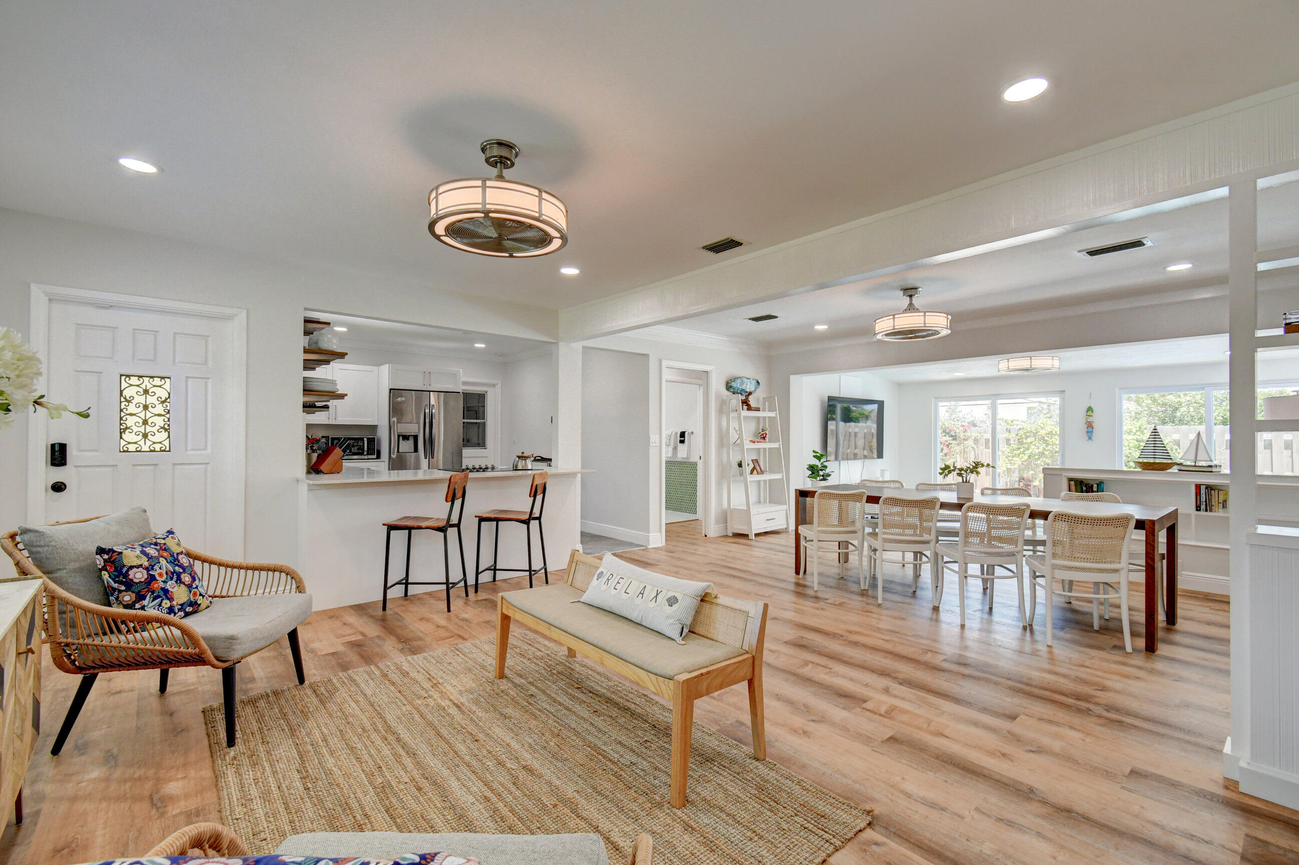 309 Rilyn Drive West Palm Beach, FL 33405 - Photo 6 of 26 a living room with furniture and wooden floor