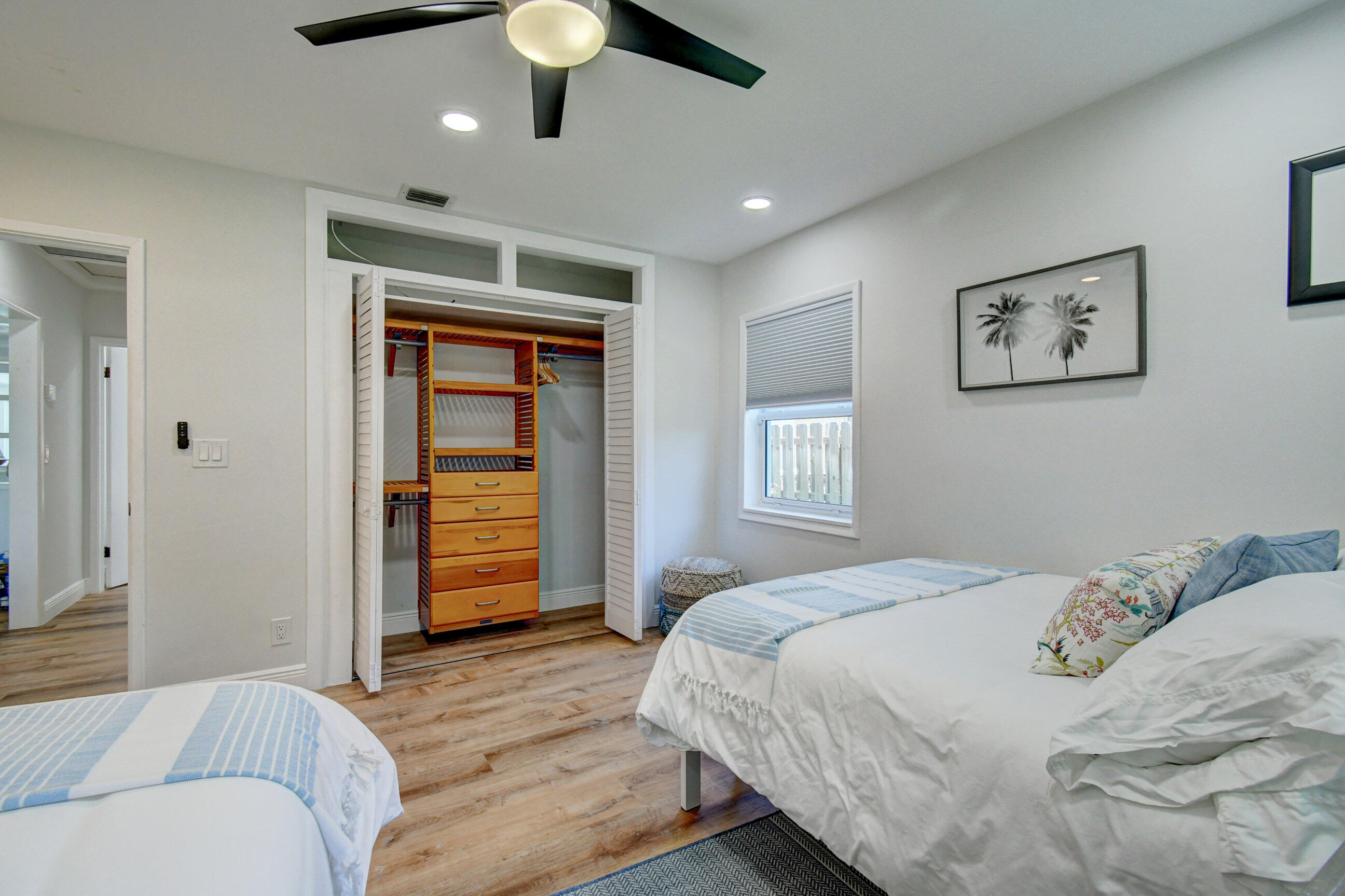 309 Rilyn Drive West Palm Beach, FL 33405 - Photo 9 of 26 a bedroom with a bed and a tv