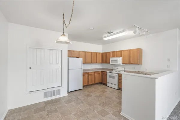 $305,000 | 3252 East 103rd Drive, Unit 709, Thornton, CO 80229