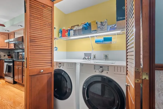 a utility room with dryer and washer