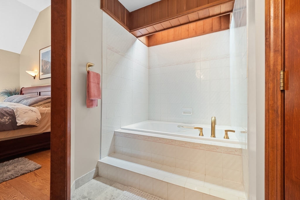 45 North Farms Road Williamsburg, MA 01039 - Photo 23 of 41 a bathroom with a bathtub and shower