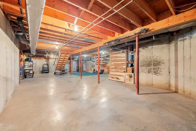 a view of a room with wooden walls