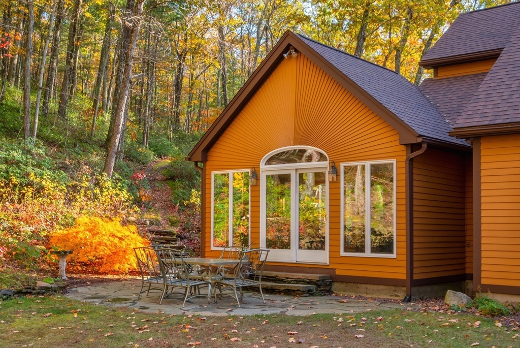 45 North Farms Road Williamsburg, MA 01039 - Photo 33 of 41 a view of house with a yard