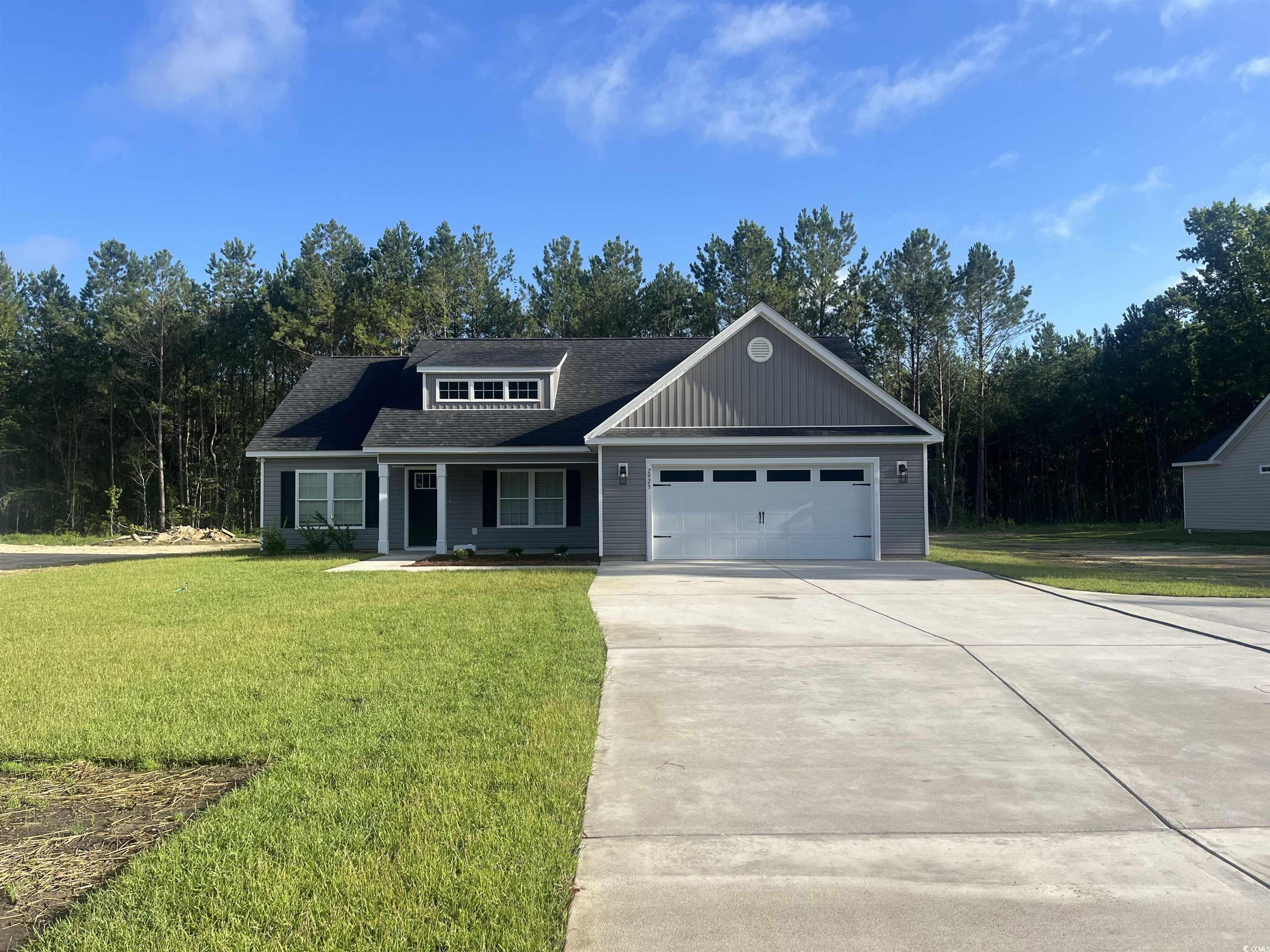 2925 Hughes Gasque Road Aynor, SC 29511 - Photo 1 of 12 View of front facade featuring a front yard, an at